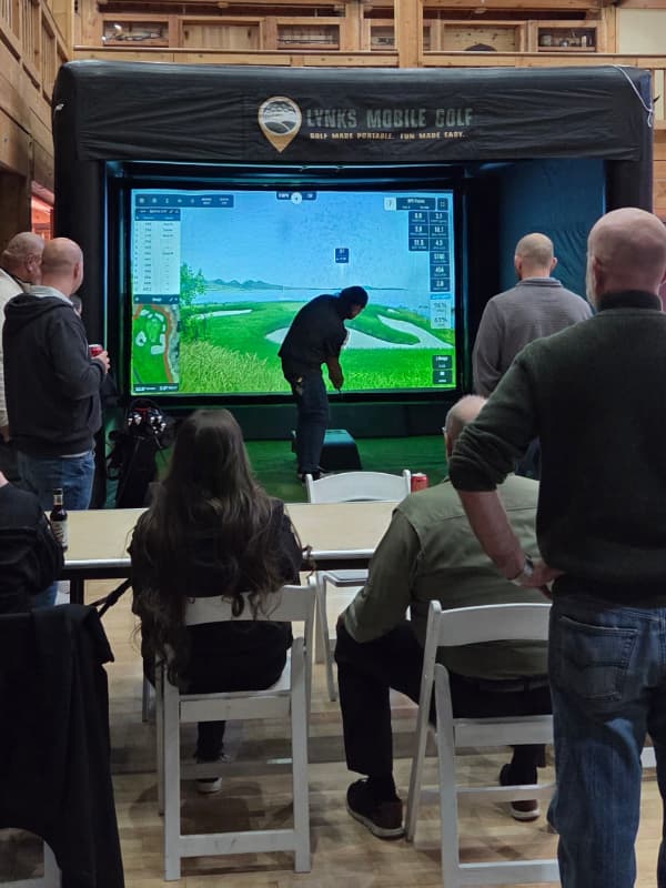 Golf simulator set up at a Utah event venue
