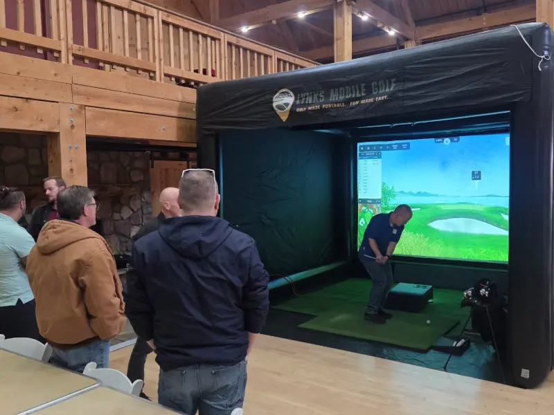 Non-golfer having fun at a Lynks Mobile Golf corporate event