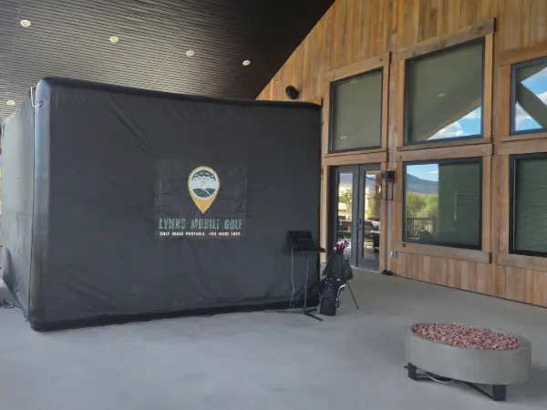 Lynks Mobile Golf simulator setup at a Utah event venue